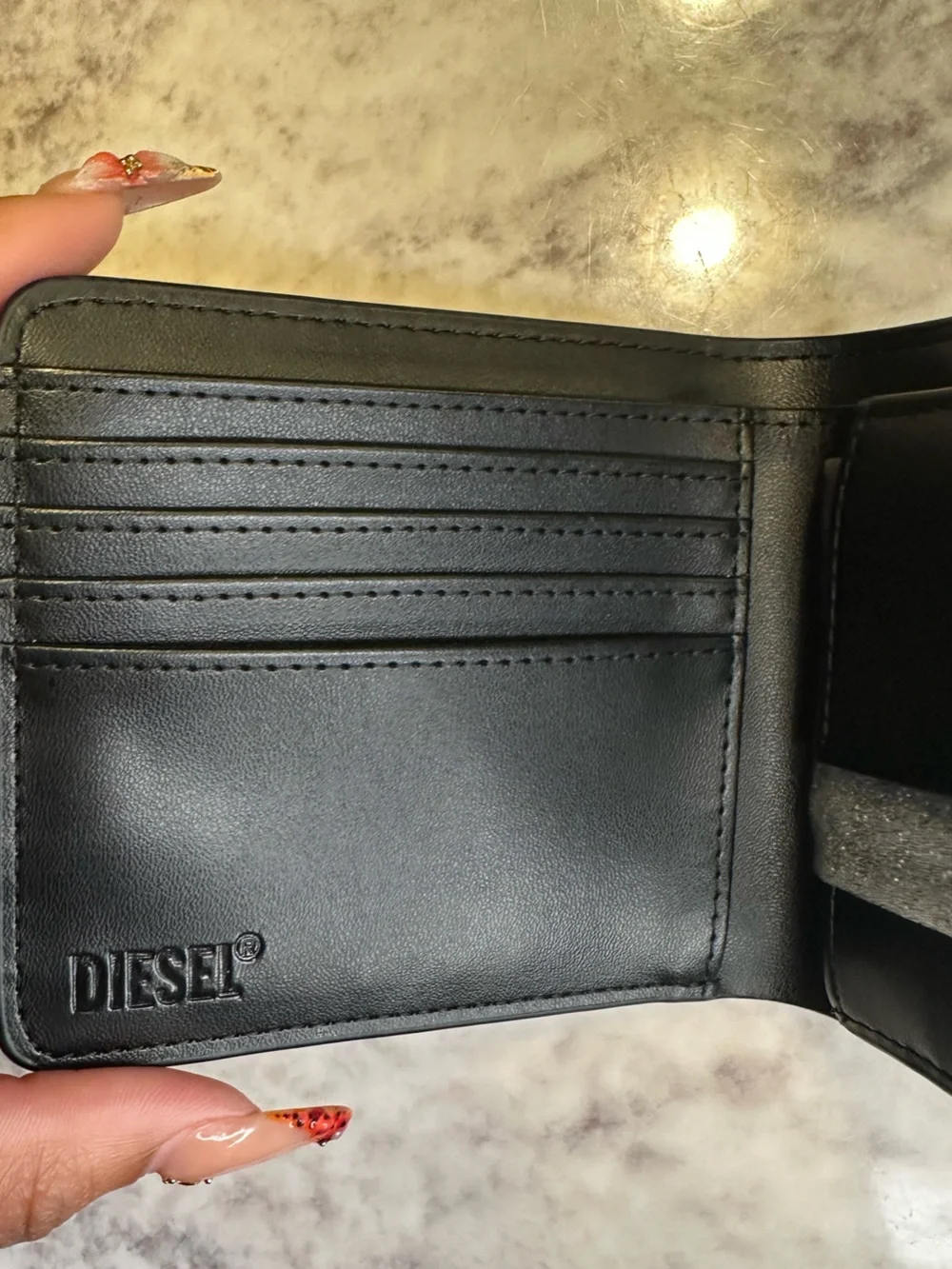 Diesel Black Leather Compact Wallet with Embossed Logo